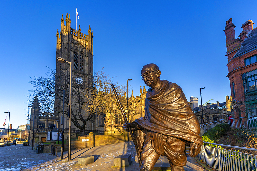 View of Mahatma Gandhi Statue and Manchester Cathedral, Manchester, Lancashire, England, United Kingdom, Europe