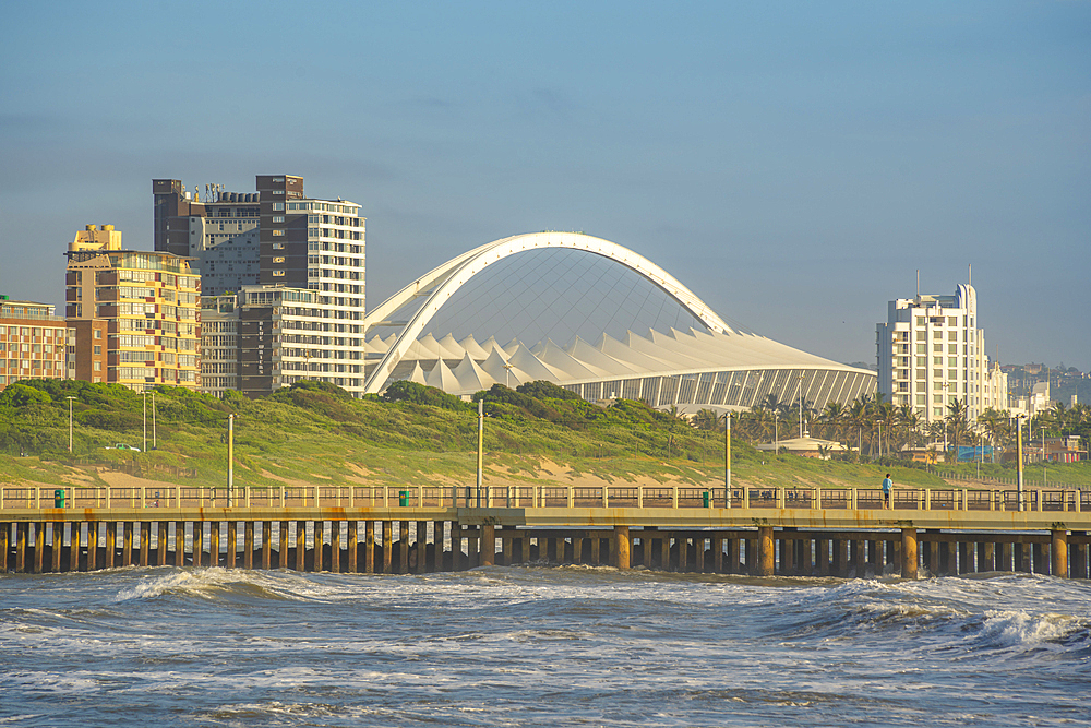 View of Moses Mabhida Stadium from pier in Indian Ocean, Durban, KwaZulu-Natal Province, South Africa, Africa