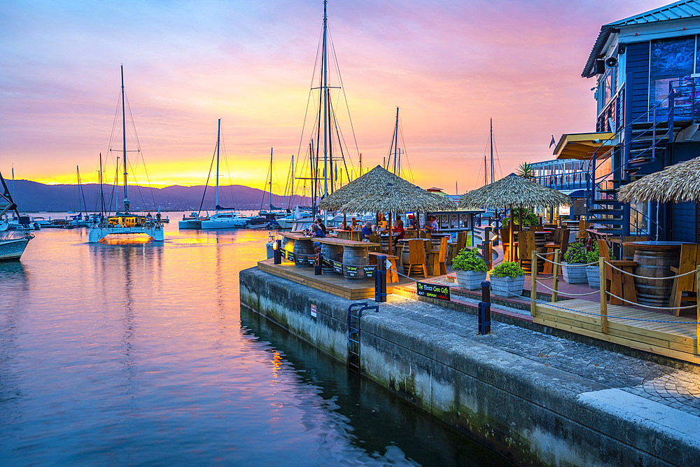 View of golden sunset, boats and restaurants at Knysna Waterfront, Knysna, Western Cape Province, South Africa, Africa