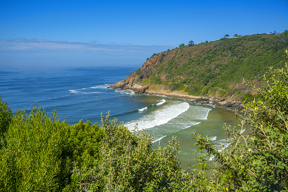 View of Indian Ocean and dramatic coastline at Wilderness from Dolphin Point, Wilderness, Western Cape, South Africa, Africa