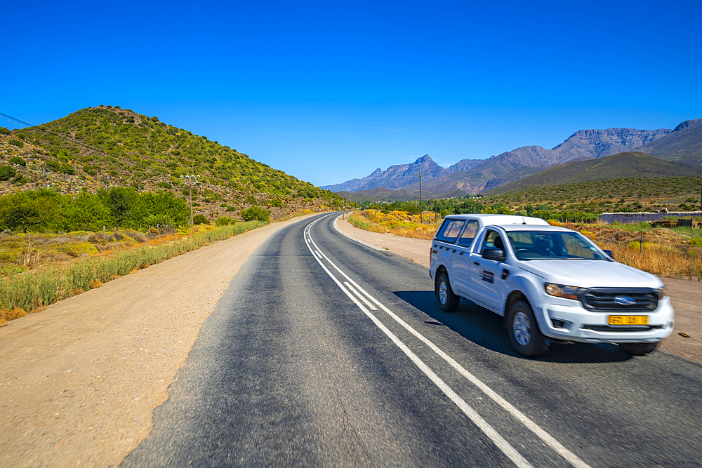 View of road R62 and green mountainous landscape between Zoar and Calitzdorp, South Africa, Africa