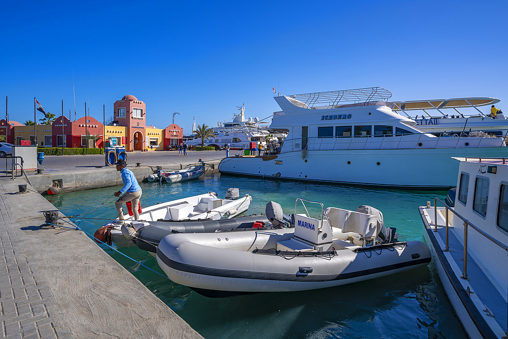 View of boats and colourful Harbour Office in Hurghada Marina, Hurghada, Red Sea Governorate, Egypt, North Africa, Africa