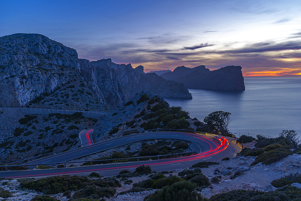 View of trail lights at dusk and road leading to Cap Formentor, Majorca, Balearic Islands, Spain, Mediterranean, Europe