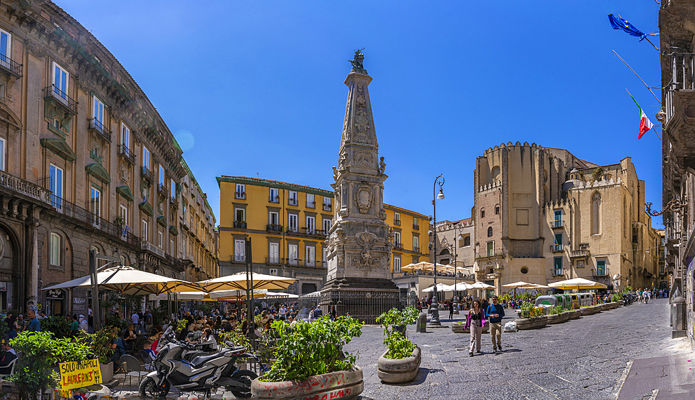 View of Obelisco di San Domenico and cafes in Piazza San Domenico Maggiore, Historic Centre, UNESCO World Heritage Site, Naples, Campania, Italy, Europe