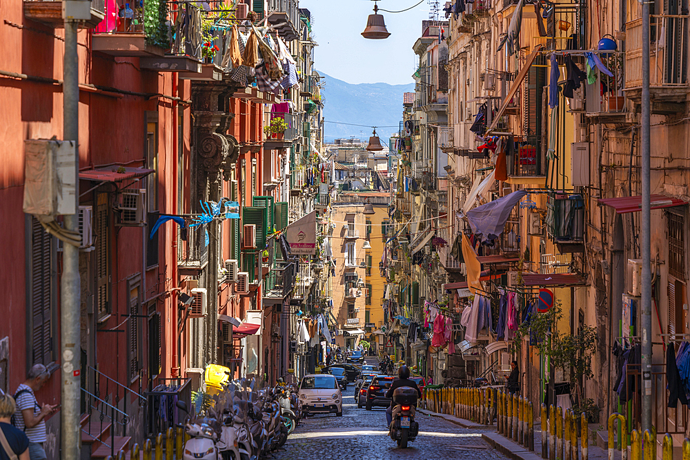 View of motocyclists and architecture on Via Francesco Girardi, Naples, Campania, Italy, Europe