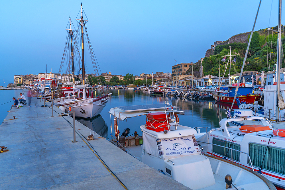 View of boats in the Old Port Marina at dusk, Corfu, Ionian Sea, Greek Islands, Greece, Europe