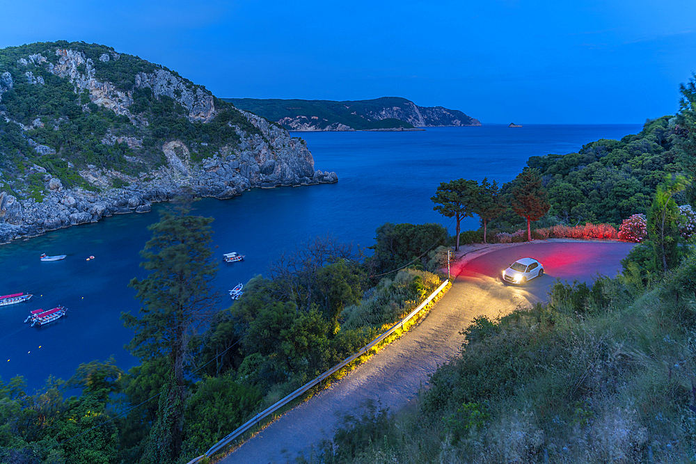 View of Agios Spiridon Beach from Monastery of Paleokastritsa at night, Palaiokastritsa, Corfu, Ionian Sea, Greek Islands, Greece, Europe