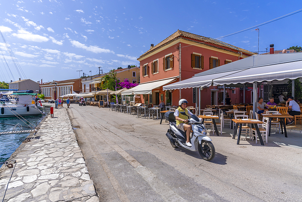 View of cafes in the harbour in Gaios Town, Paxos, Ionian Sea, Greek Islands, Greece, Europe