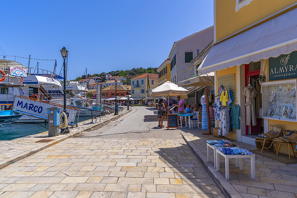 View of boats and cafes in the harbour in Gaios Town, Paxos, Ionian Sea, Greek Islands, Greece, Europe