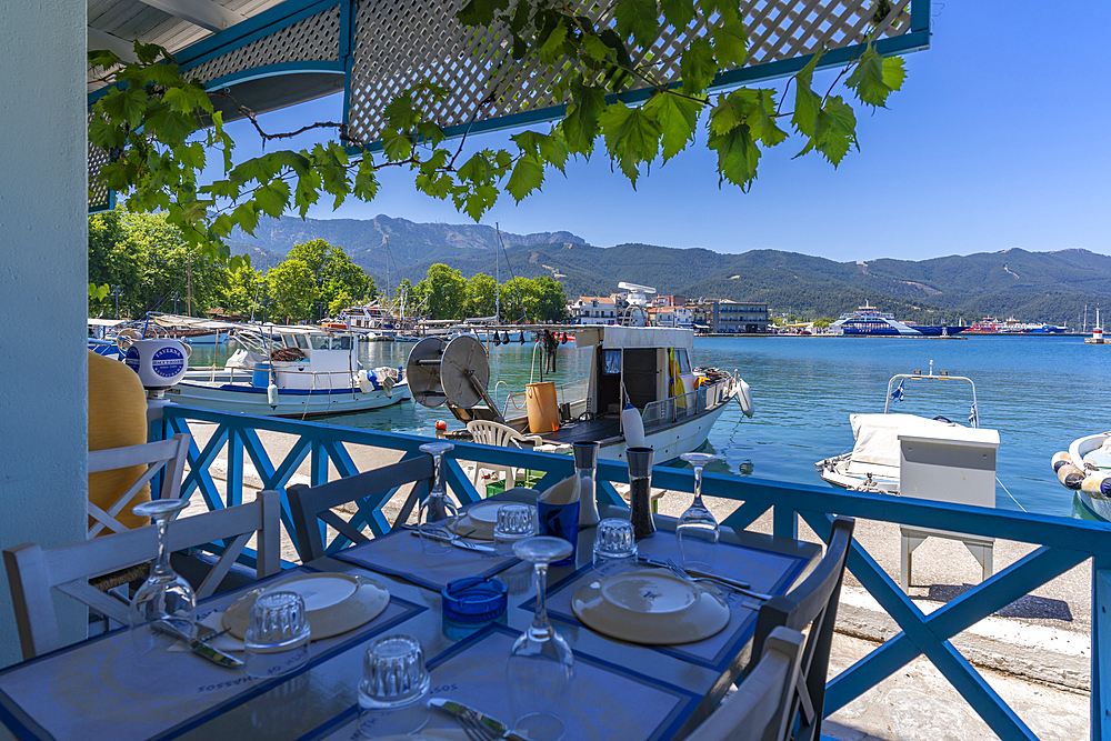 View of restaurant and harbour in Thassos Town, Thassos, Aegean Sea, Greek Islands, Greece, Europe