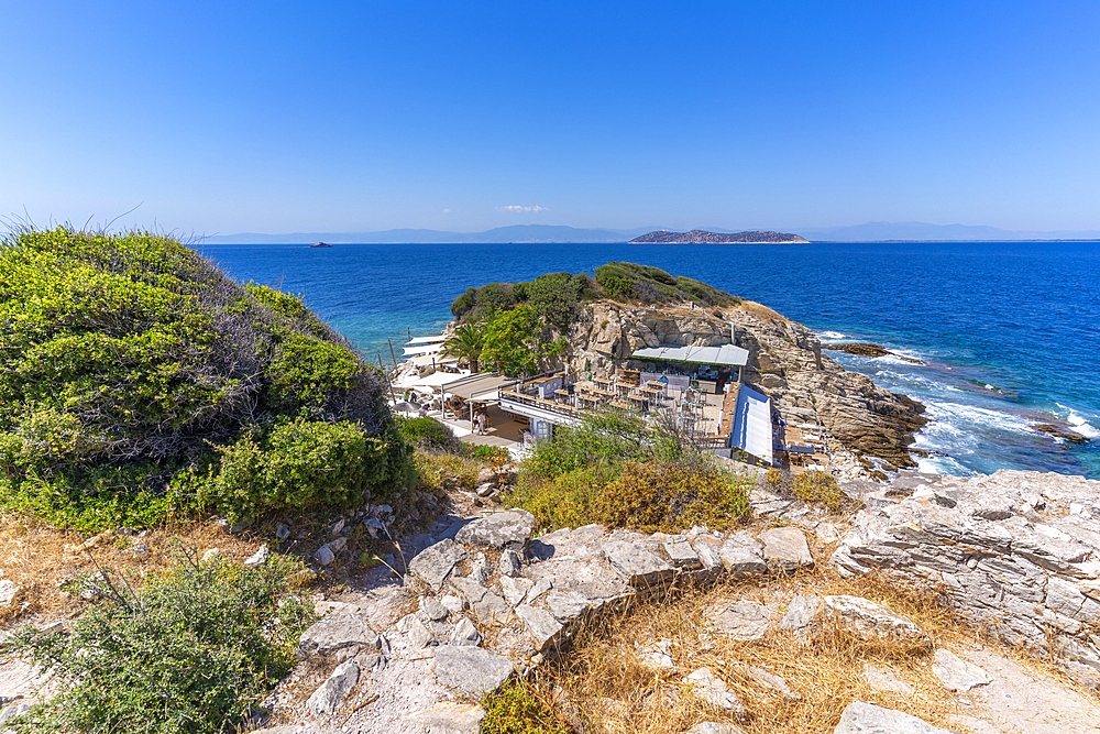 View of bar and cafe near Church of the Holy Apostles in Thassos Town, Thassos, Aegean Sea, Greek Islands, Greece, Europe