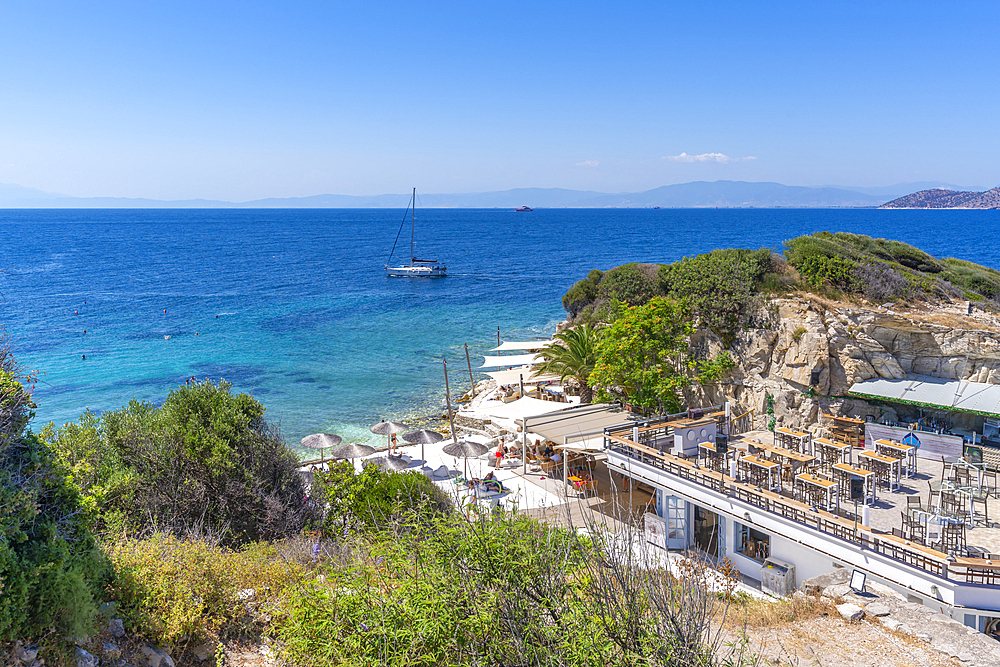 View of bar and cafe near Church of the Holy Apostles in Thassos Town, Thassos, Aegean Sea, Greek Islands, Greece, Europe