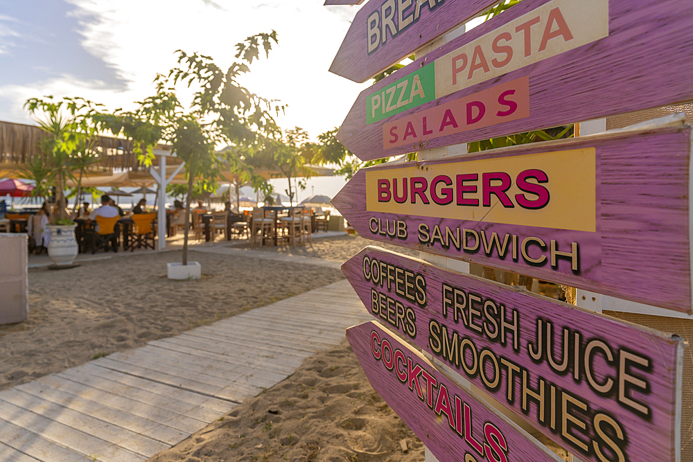 View of restaurant and sign in Thassos Town, Thassos, Aegean Sea, Greek Islands, Greece, Europe