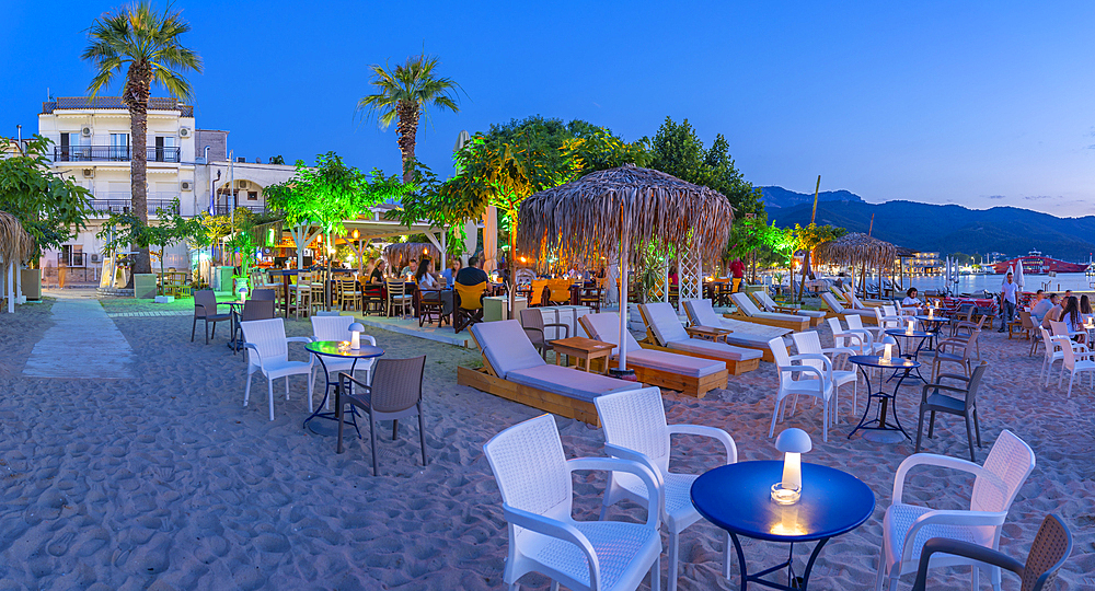 View of restaurant on beach after sunset, Thassos Town, Thassos, Aegean Sea, Greek Islands, Greece, Europe