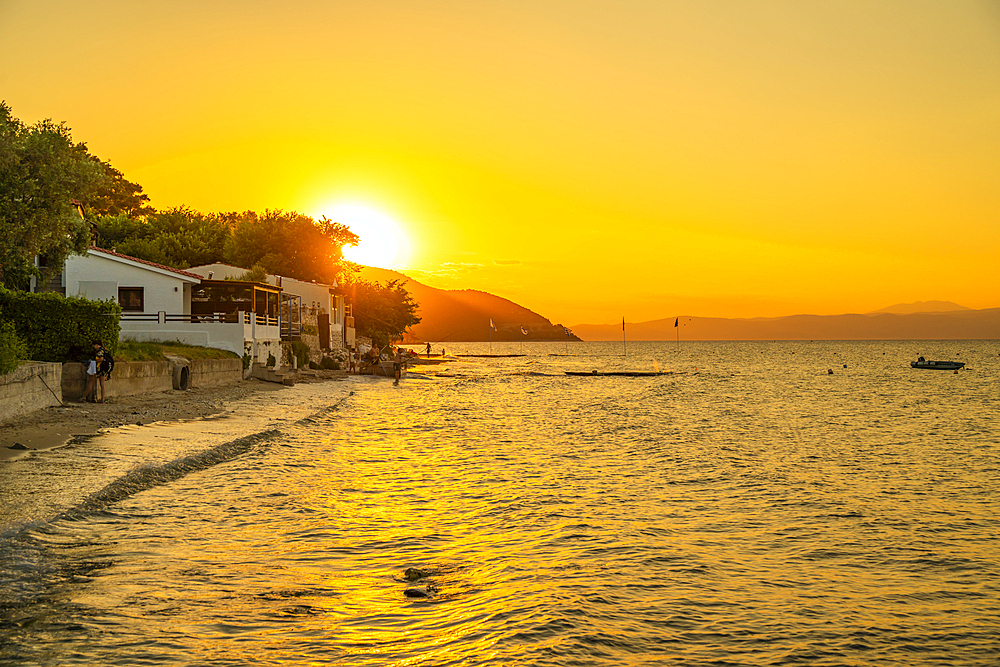 View of Nisteri Beach at sunset, Thassos Town, Thassos, Aegean Sea, Greek Islands, Greece, Europe