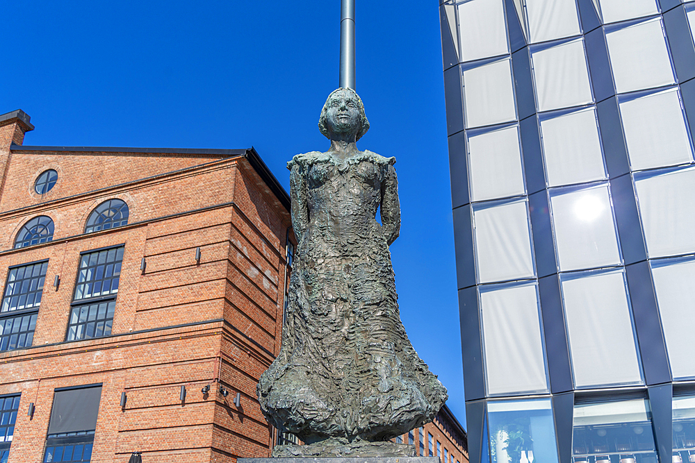 View of Aasta Hansteen statue and waterfront architecture in background, Aker Brygge, Oslo, Norway, Scandinavia, Europe