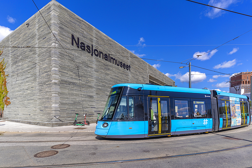 View of The National Museum and city tram, Aker Brygge, Oslo, Norway, Scandinavia, Europe