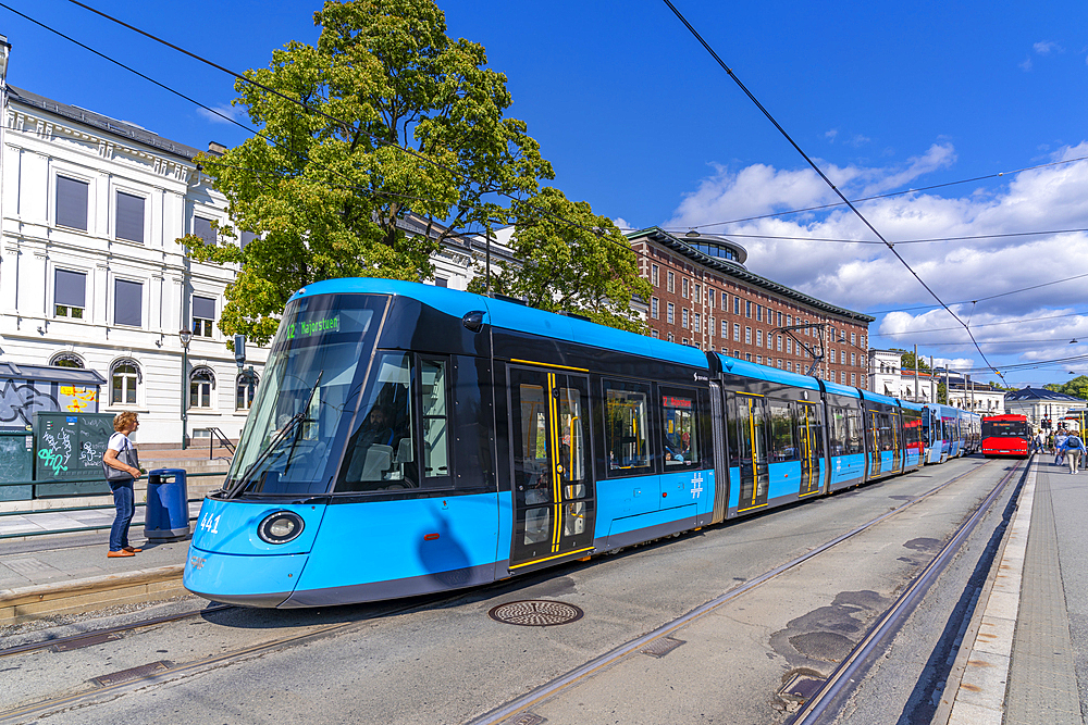 View of city tram on Henrik Ibsens Gate, Aker Brygge, Oslo, Norway, Scandinavia, Europe