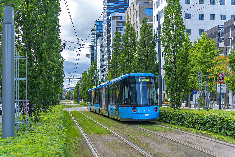 View of city tram in Barcode area on a sunny day, Oslo, Norway, Scandinavia, Europe