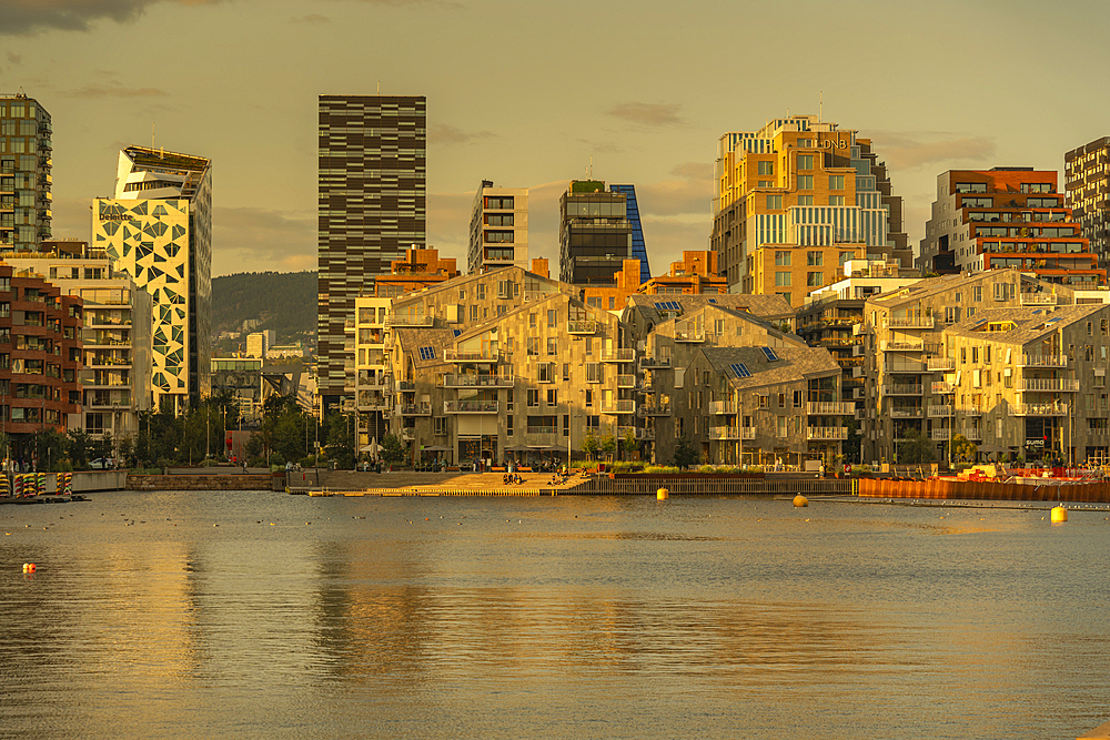 View of the Barcode and city skyline during golden hour, Oslo, Norway, Scandinavia, Europe