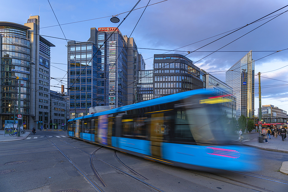 View of buildings and city tram in Jernbanetorget, Oslo, Norway, Scandinavia, Europe