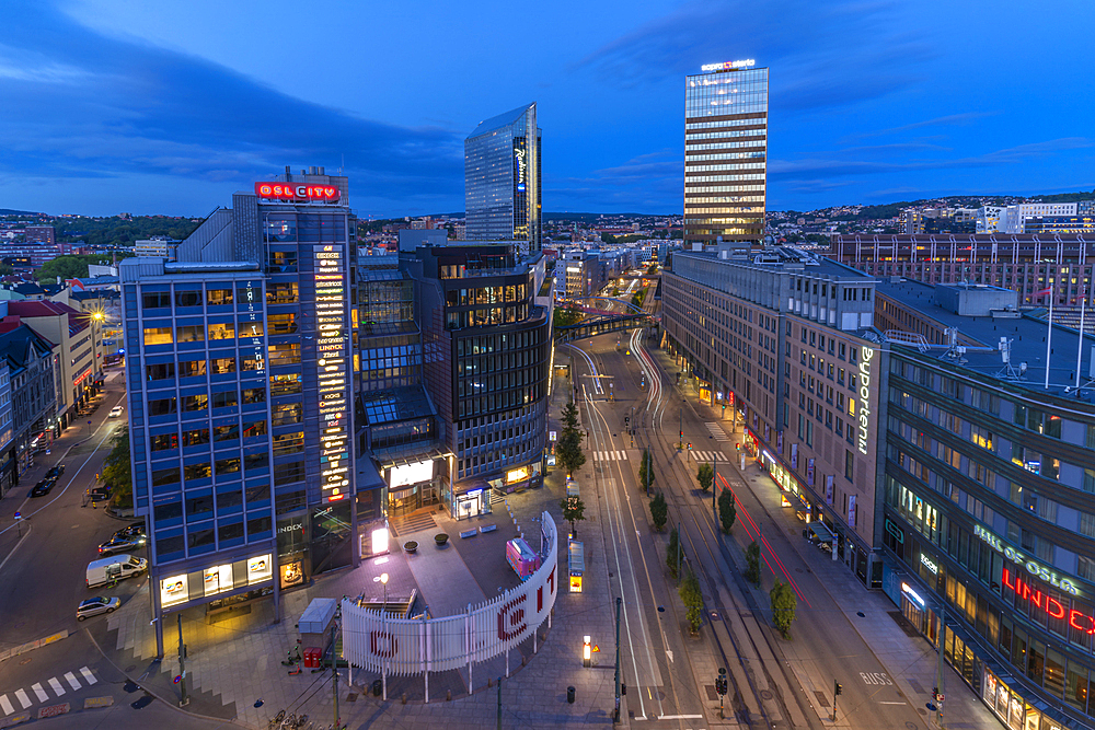 View of Jernbanetorget and city skyline from elevated position at dusk, Oslo, Norway, Scandinavia, Europe