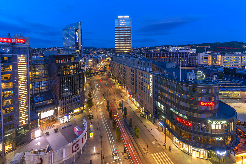 View of Jernbanetorget and city skyline from elevated position at dusk, Oslo, Norway, Scandinavia, Europe