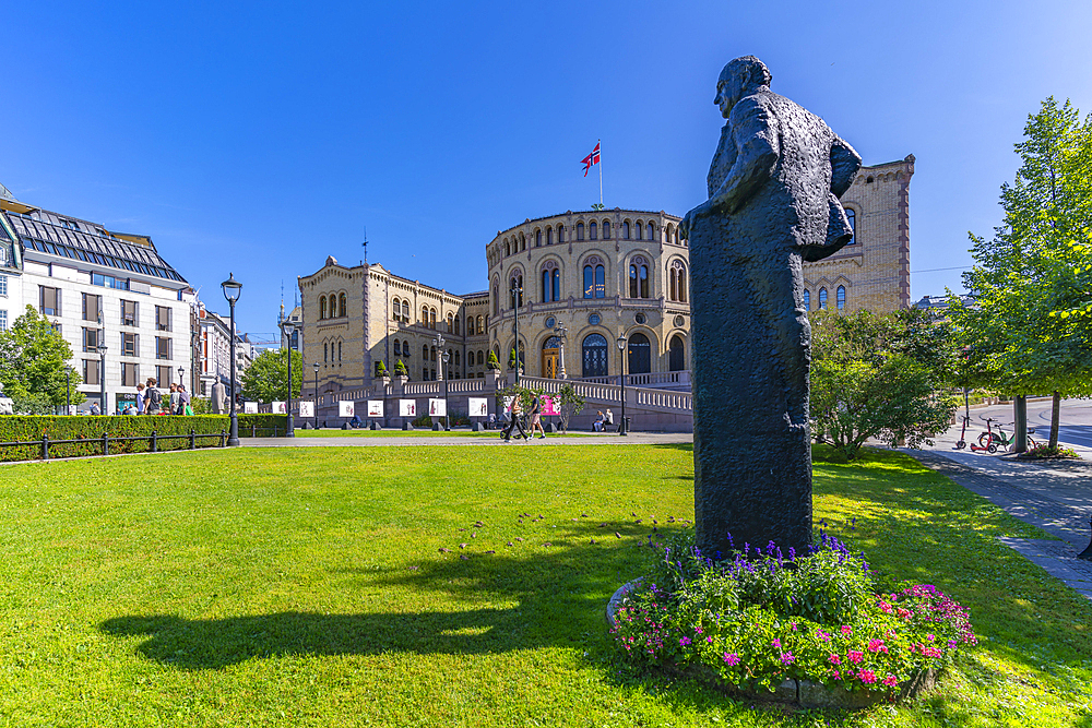 View of Grand Hotel and Norwegian Parliament in Stortingsparken on a sunny day, Oslo, Norway, Scandinavia, Europe