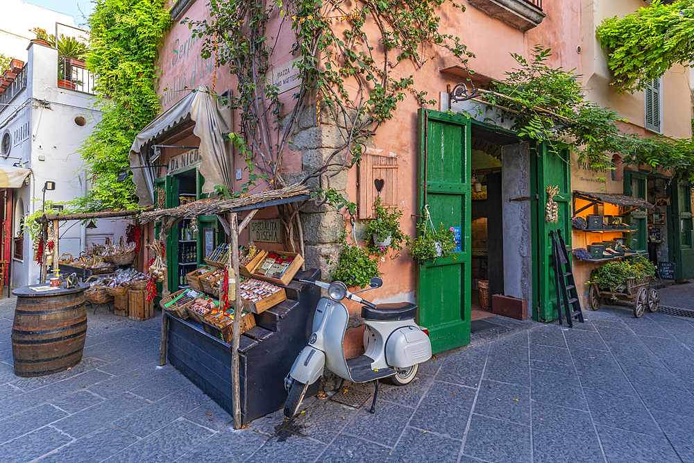 View of scooter outside shop in Piazza Giacomo Matteotti, Forio, Island of Ischia, Campania, Italy, Europe