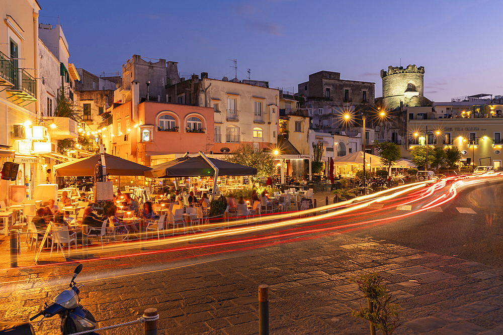 View of cafes and bars on Via Marina at dusk, Forio, Island of Ischia, Campania, Italy, Europe