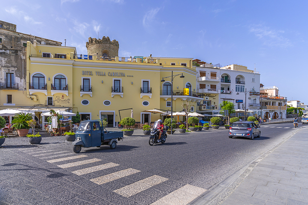 View of cafes and bars at the marina and Torrione Castle Museum, Forio, Island of Ischia, Campania, Italy, Europe