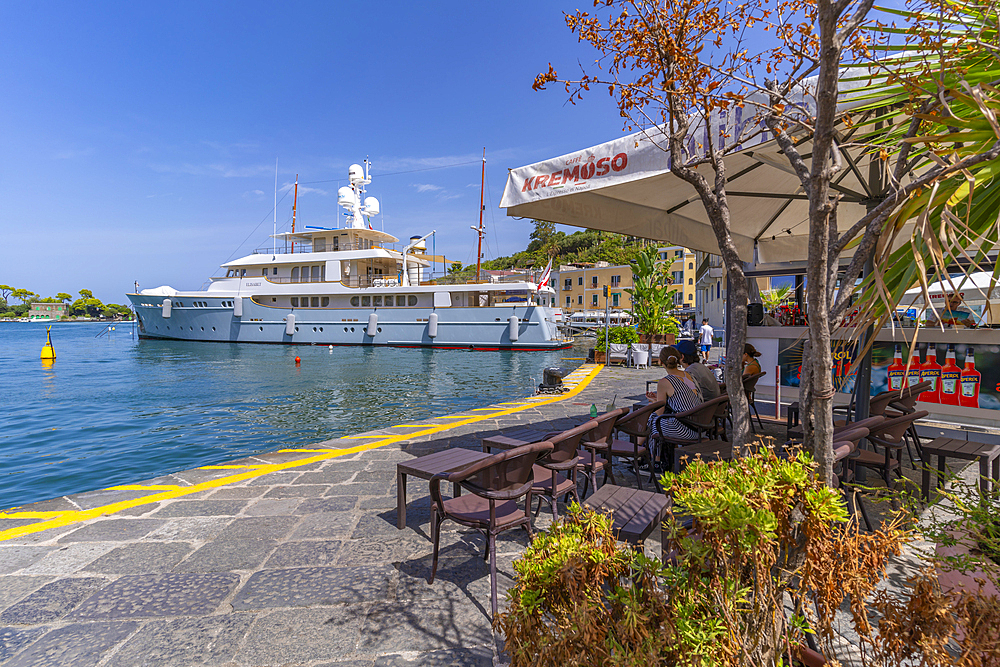 View of boats and bar in Porto d'Ischia (Port of Ischia), Island of Ischia, Campania, Italy, Europe