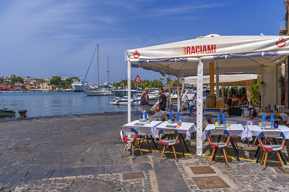 View of boats and restaurants in Porto d'Ischia (Port of Ischia), Island of Ischia, Campania, Italy, Europe