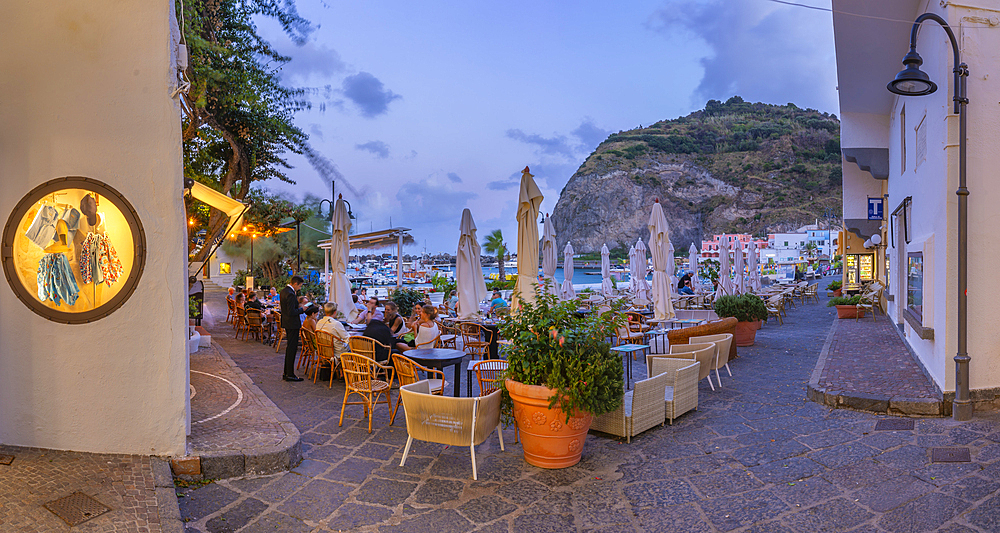 View of restaurant in Porto di Sant'Angelo at dusk, Sant'Angelo, Island of Ischia, Campania, Italy, Europe