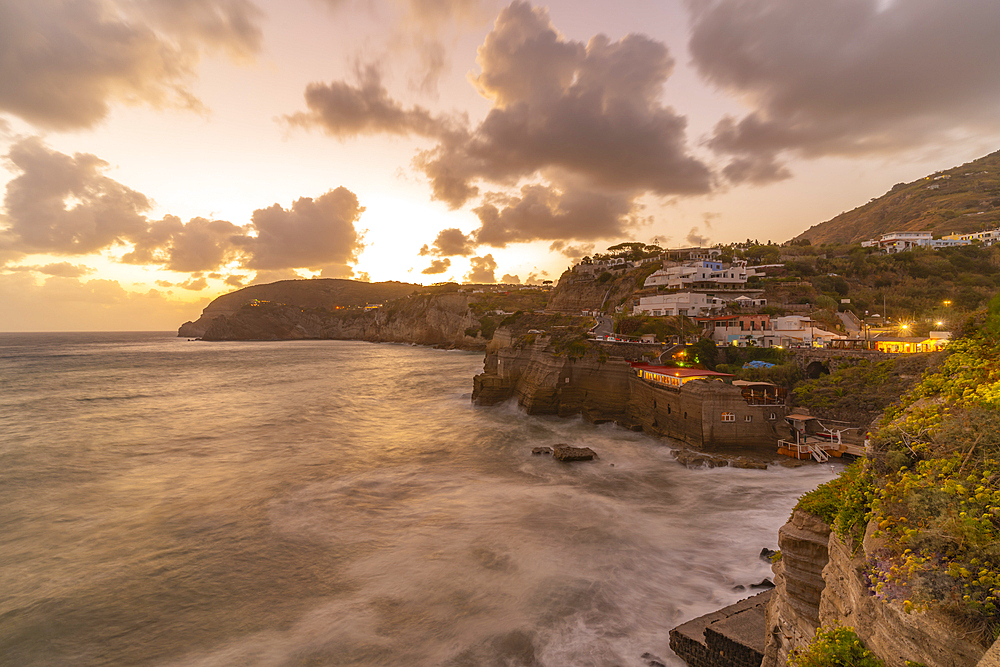 View of coastline at dusk from Sant'Angelo, Sant'Angelo, Island of Ischia, Campania, Italy, Europe