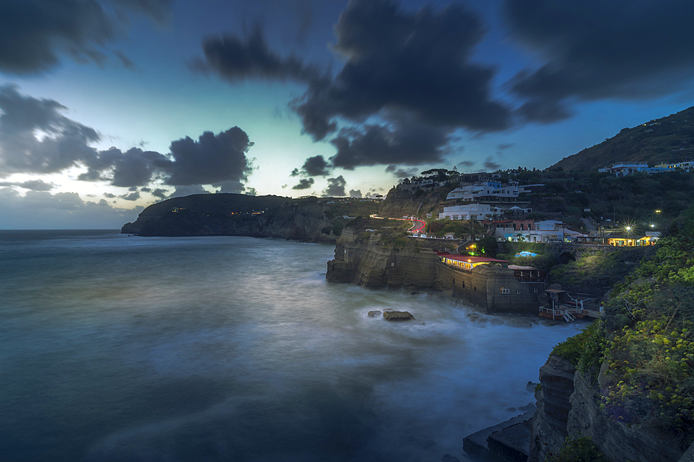 View of coastline at dusk from Sant'Angelo, Sant'Angelo, Island of Ischia, Campania, Italy, Europe