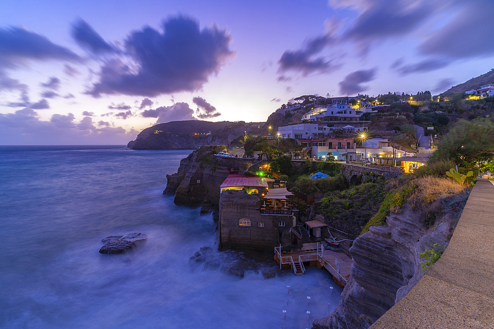 View of coastline at dusk from Sant'Angelo, Sant'Angelo, Island of Ischia, Campania, Italy, Europe