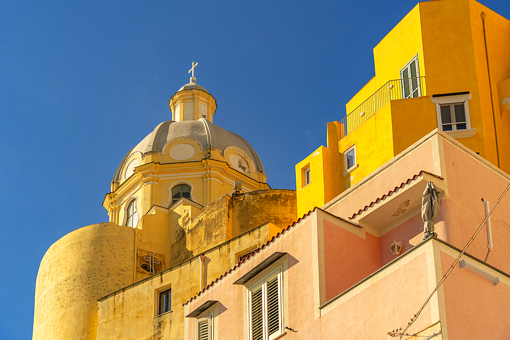 View of colourful buildings and Church of Santa Maria delle Grazie, Procida, Phlegraean Islands, Gulf of Naples, Campania, Southern Italy, Italy, Europe