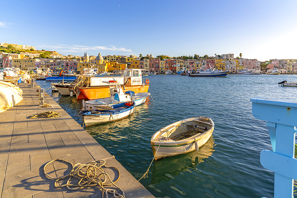 View of Church of Santa Maria della Pieta in the fishing port Marina Grande with boats at golden hour, Procida, Phlegraean Islands, Gulf of Naples, Campania, Southern Italy, Italy, Europe