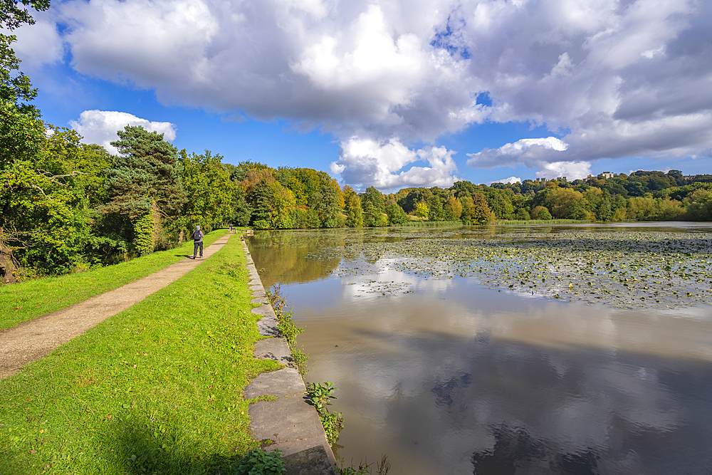 View of Hardwick Hall and dramatic clouds refecting in Hardwick Ponds, Hardwick Park, Bolsover, Derbyshire, England, United Kingdom, Europe