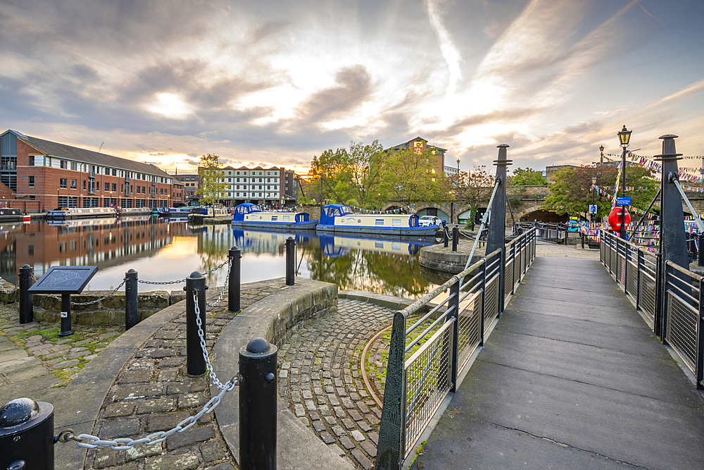 View of canal boats at Victoria Quays at sunset, Sheffield, South Yorkshire, England, United Kingdom, Europe