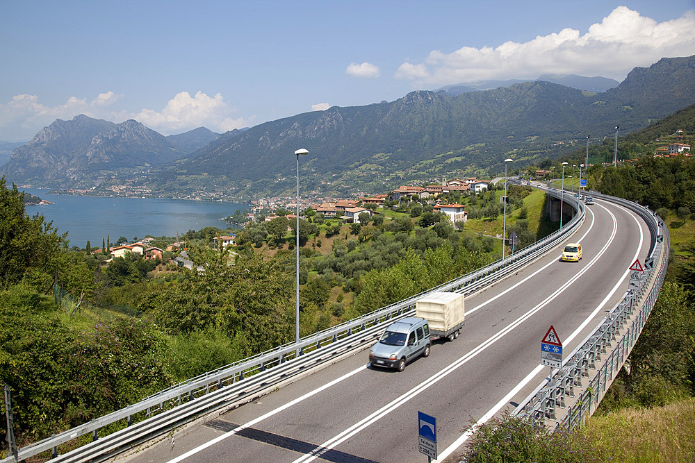 Lake and the S10 road, Lake Iseo, Lombardy, Italian Lakes, Italy, Europe