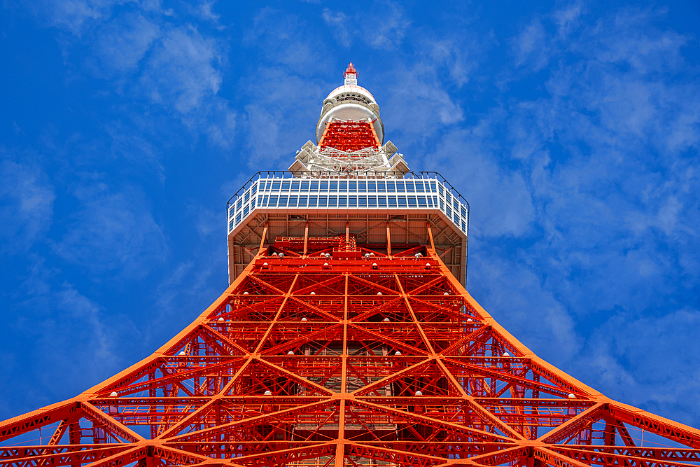 View of Tokyo Tower from its base against blue sky, Shibakoen, Minato City, Tokyo, Honshu, Japan