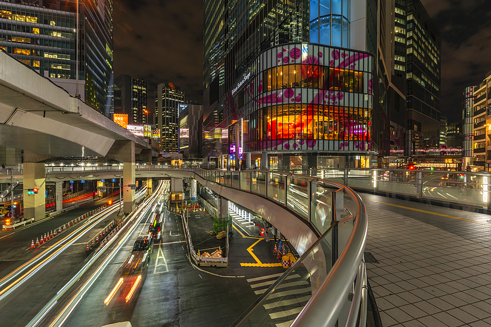 View of buildings and trail lights around Shibuya Station area at night, Shibuya District, Kamiyamacho, Shibuya City, Tokyo, Honshu, Japan