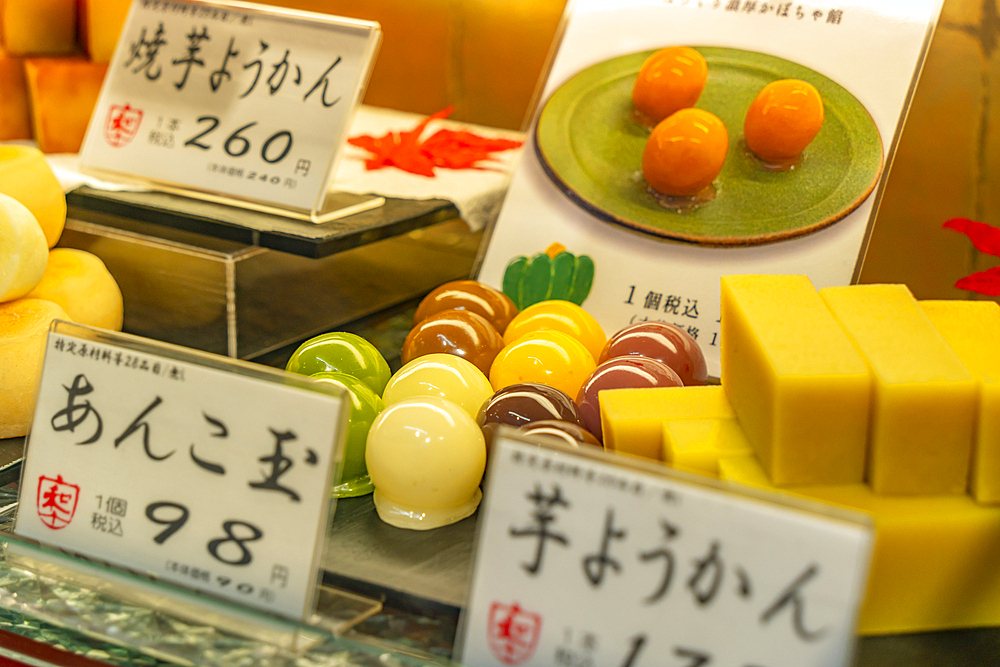 View of traditional Japanese sweets in shop window, Asakusa, Taito City, Tokyo, Honshu, Japan