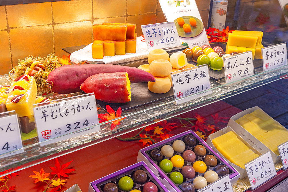 View of traditional Japanese sweets in shop window, Asakusa, Taito City, Tokyo, Japan, Asia