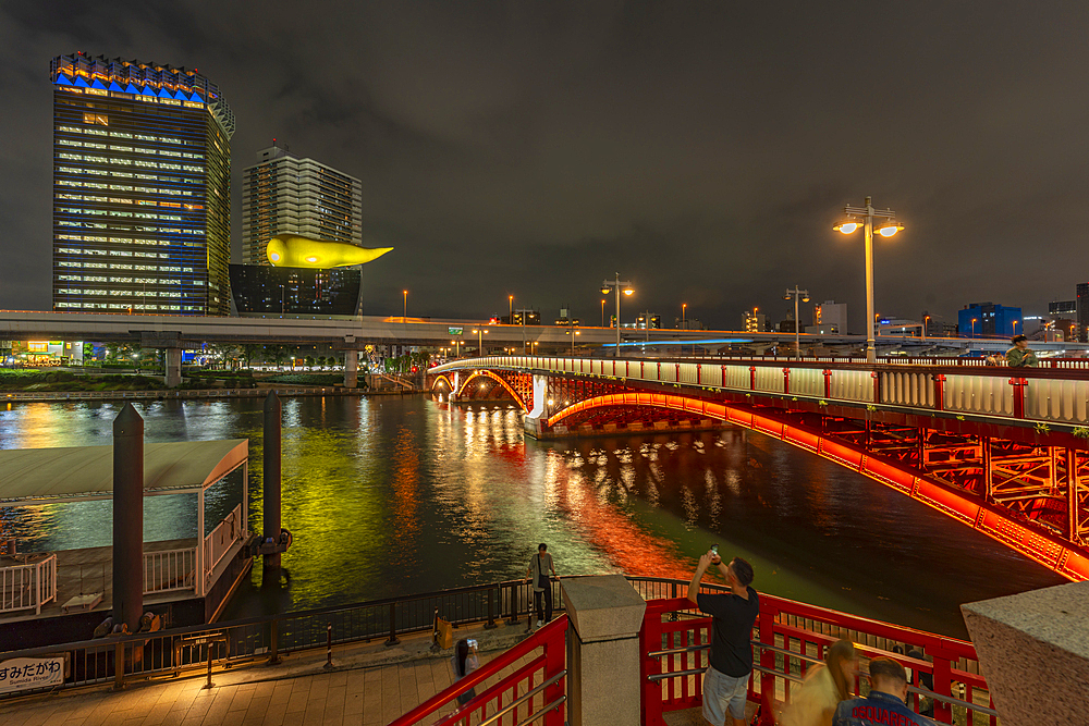 View of Azuma Bridge and Sumida River at night, Asakusa, Taito City, Tokyo, Honshu, Japan