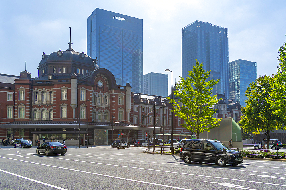 View of Tokyo Station and Chiyoda's Marunouchi business district backdrop on a sunny day, Chiyoda, Tokyo, Honshu, Japan