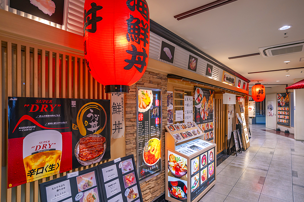 View of colourful frontage of restaurant in Omicho Market, Kanazawa City, Ishikawa Prefecture, Honshu, Japan, Asia