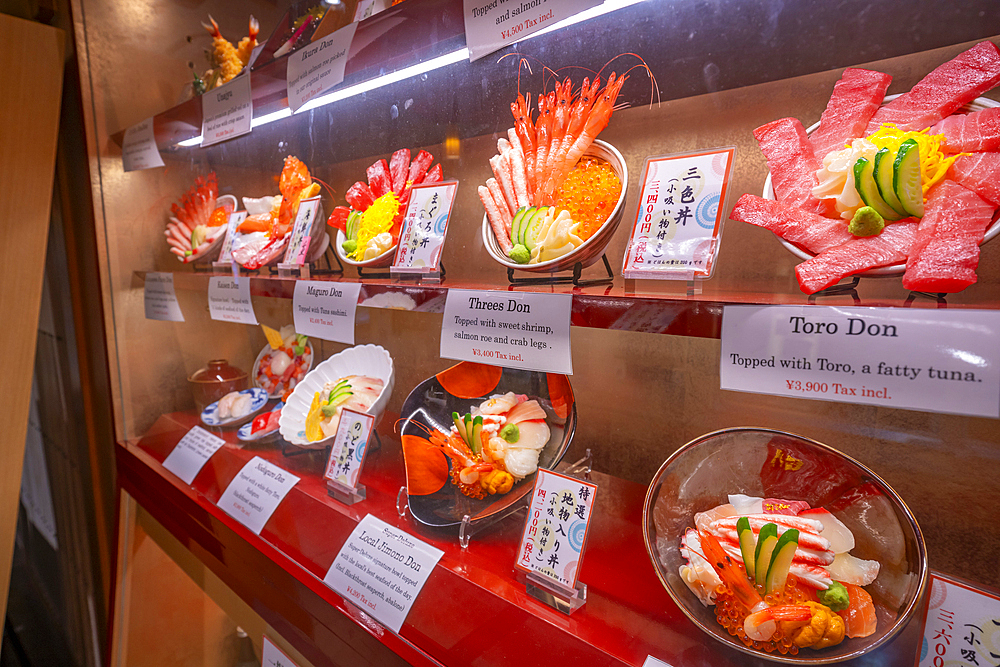 View of colourful frontage of restaurant in Omicho Market, Kanazawa City, Ishikawa Prefecture, Honshu, Japan